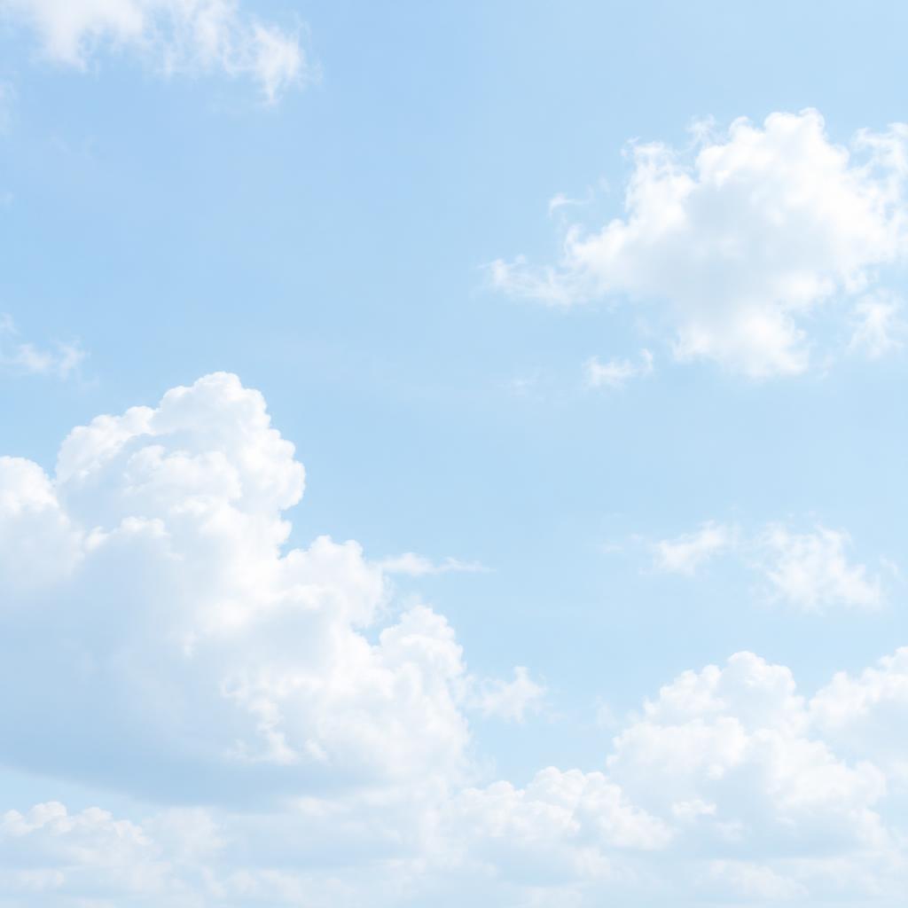 White clouds in a light-blue sky